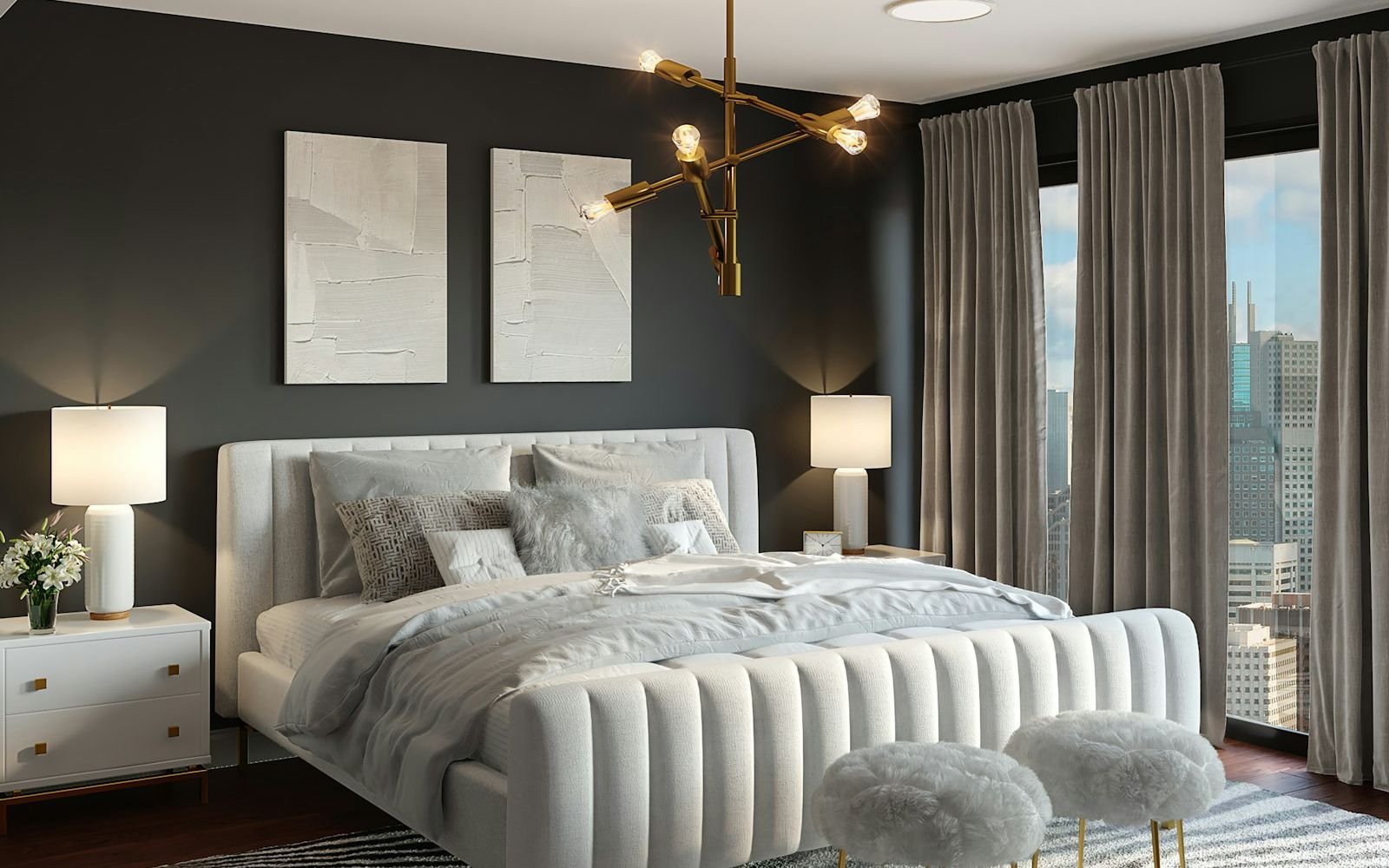 A dramatic bedroom in soft evening light, with deep charcoal walls and warm lamplight